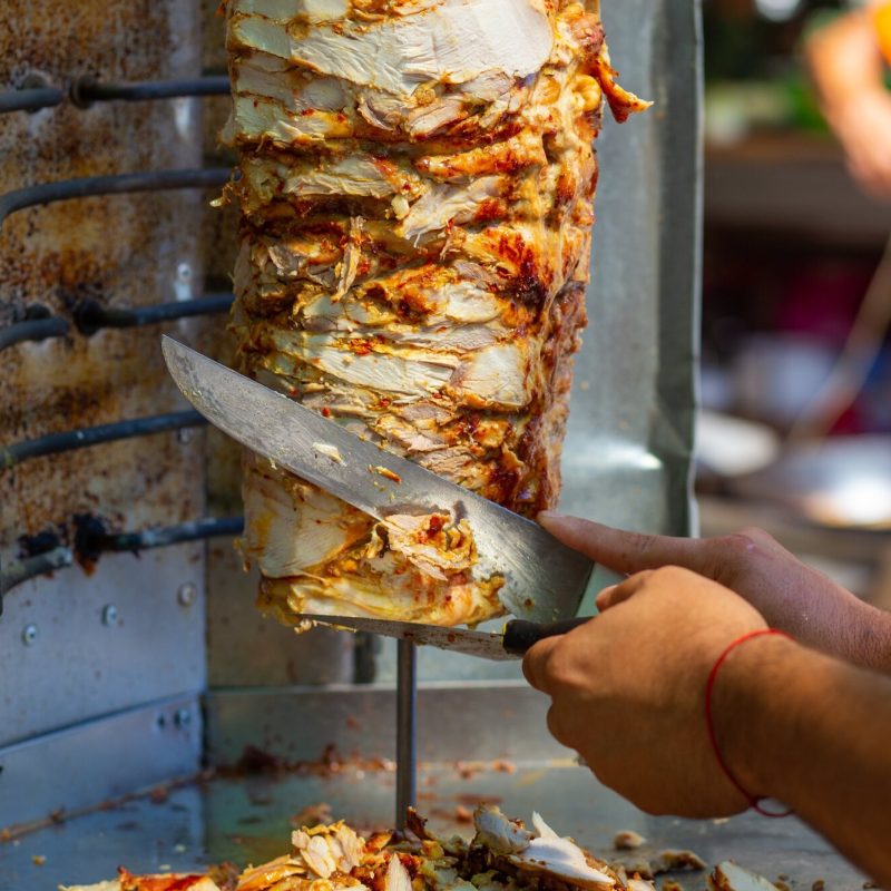 Chef,Cutting,With,Doner,Knife,Traditional,Turkish,Doner,Kebab,Meat.